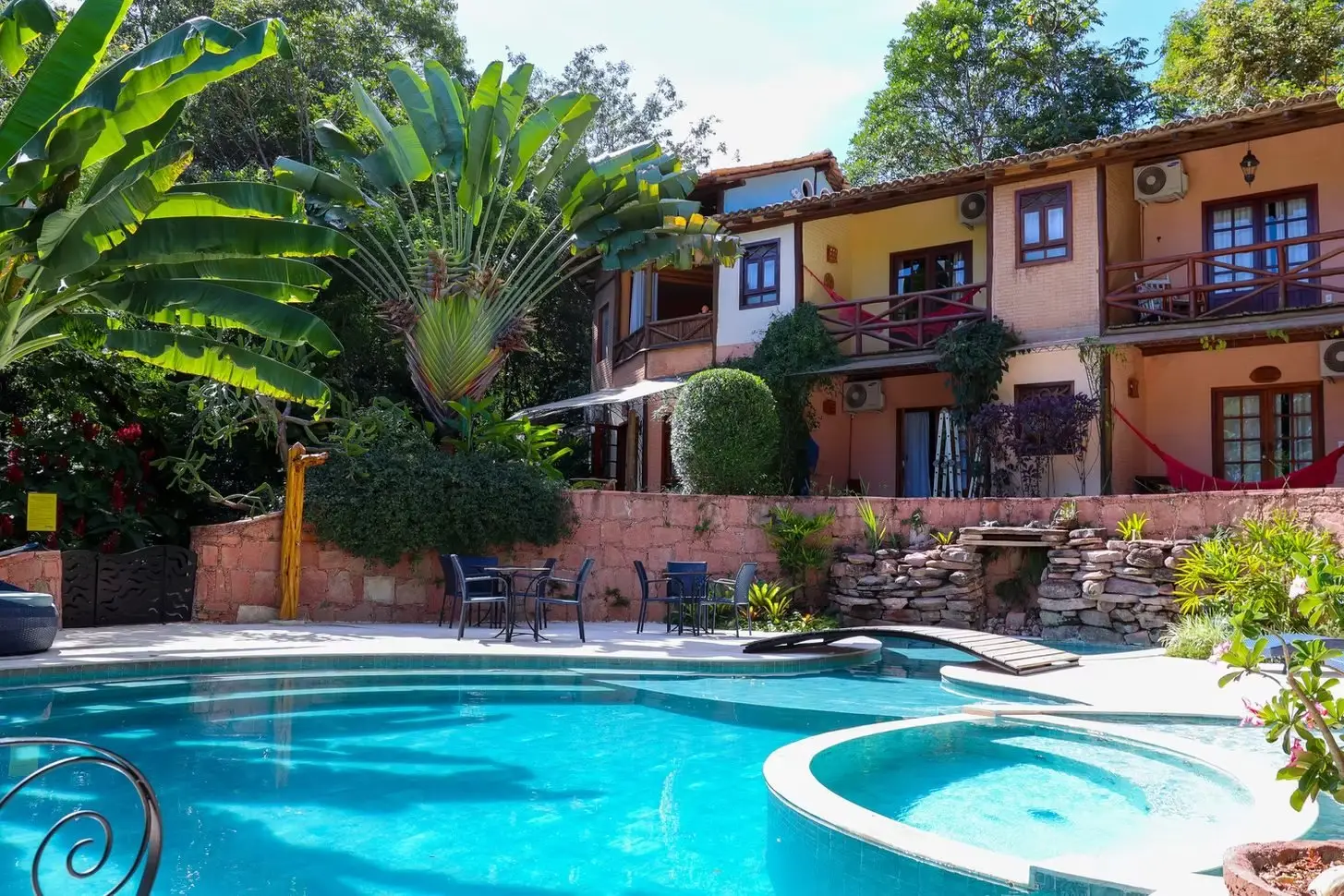 Vila Serrano pool and bungalows among the garden